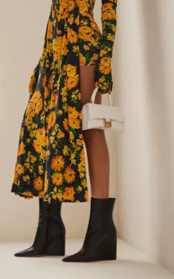 Amina Muaddi Pernille Leather Wedge Ankle Boots